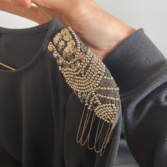 Teenflo dress black stretchy material with shoulder pads and metal detailing - Picture 7 of 7